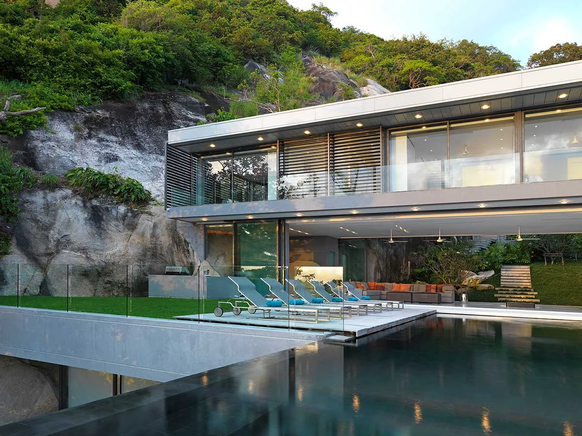 Amanzi — Glass, Rock and Ocean on the Millionaires' Mile in Kamala Beach